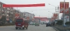 Street scene showing lunar new year decorations, Xiangcheng Henan